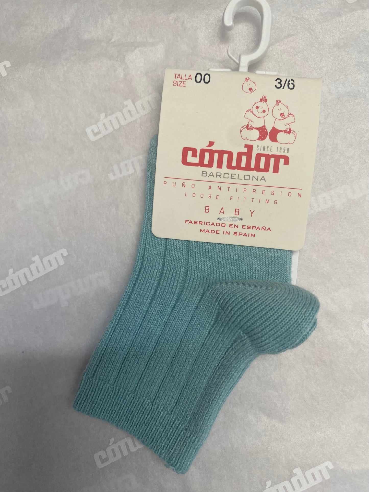 Light blue ribbed short sock for babies
